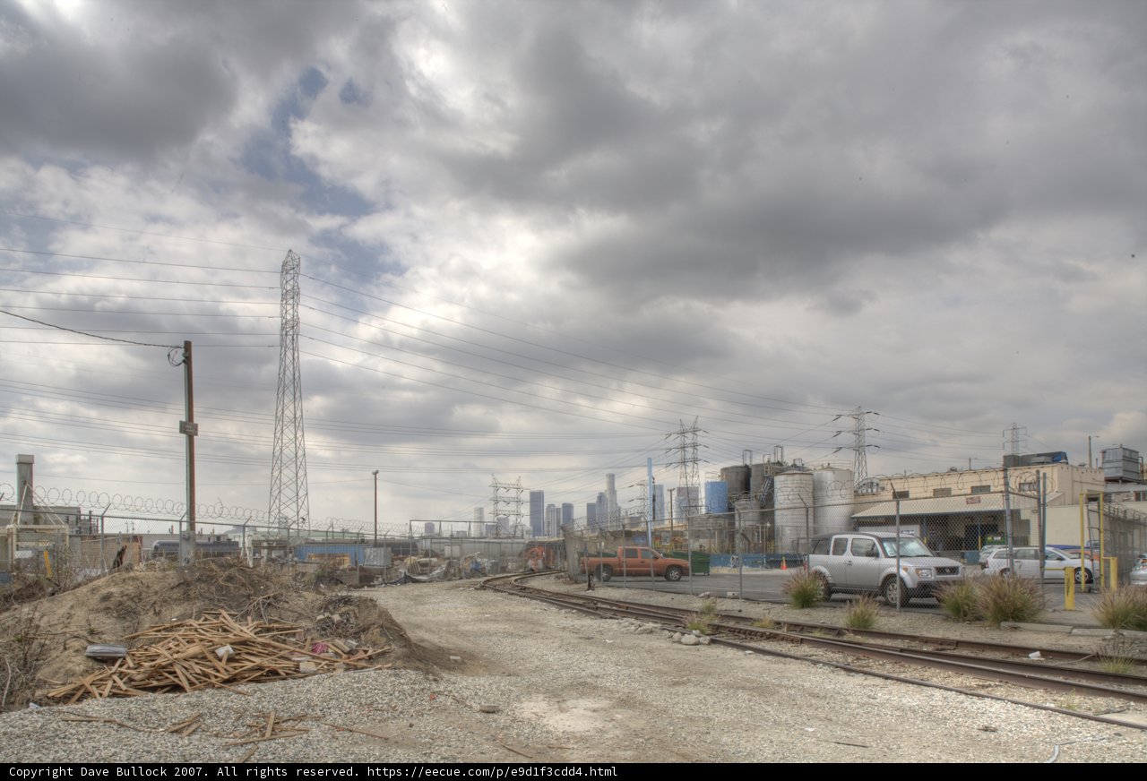 Train Yard with Power Lines and Dirt Road