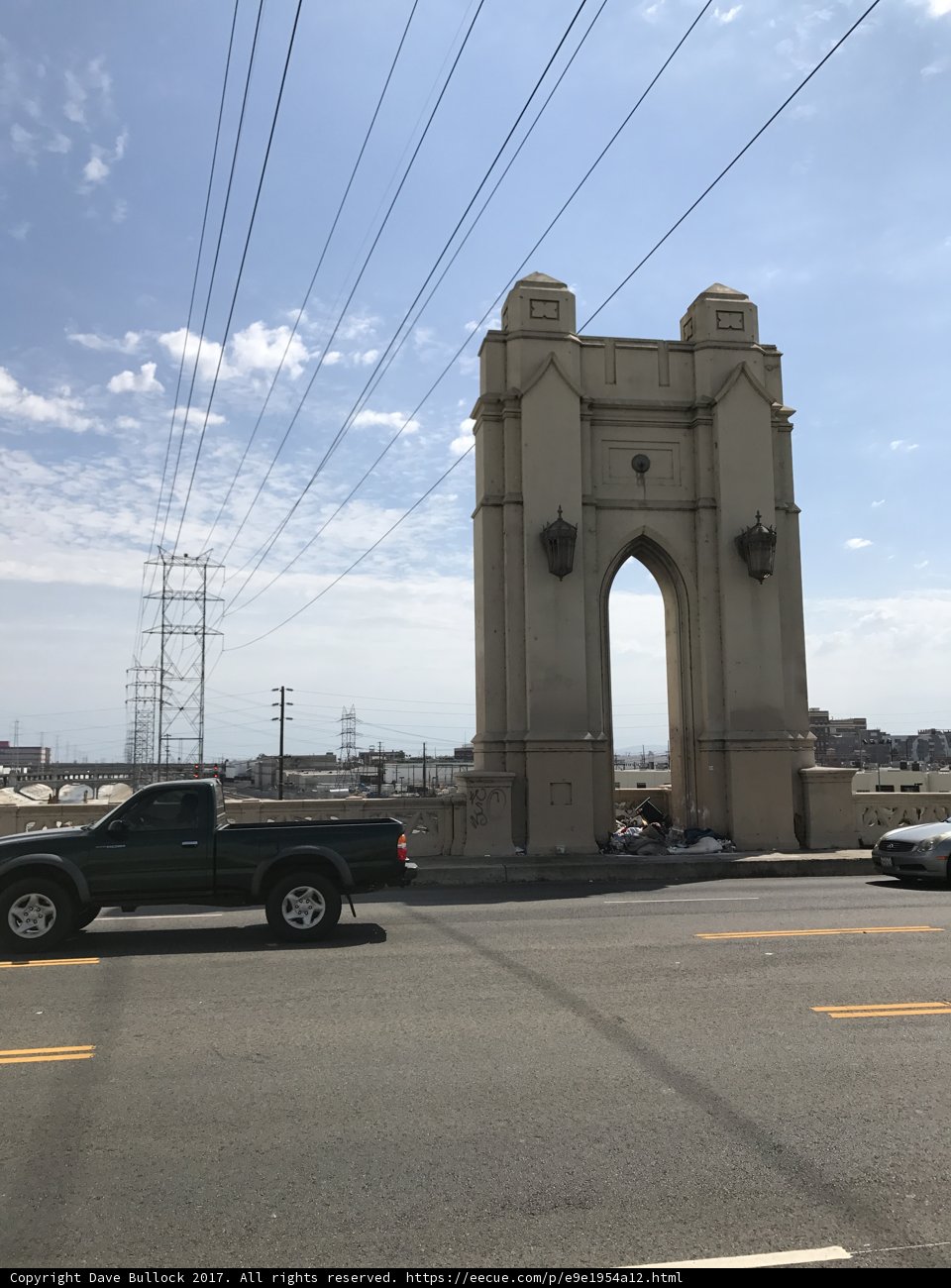 Pickup Truck Driving past Majestic Arch