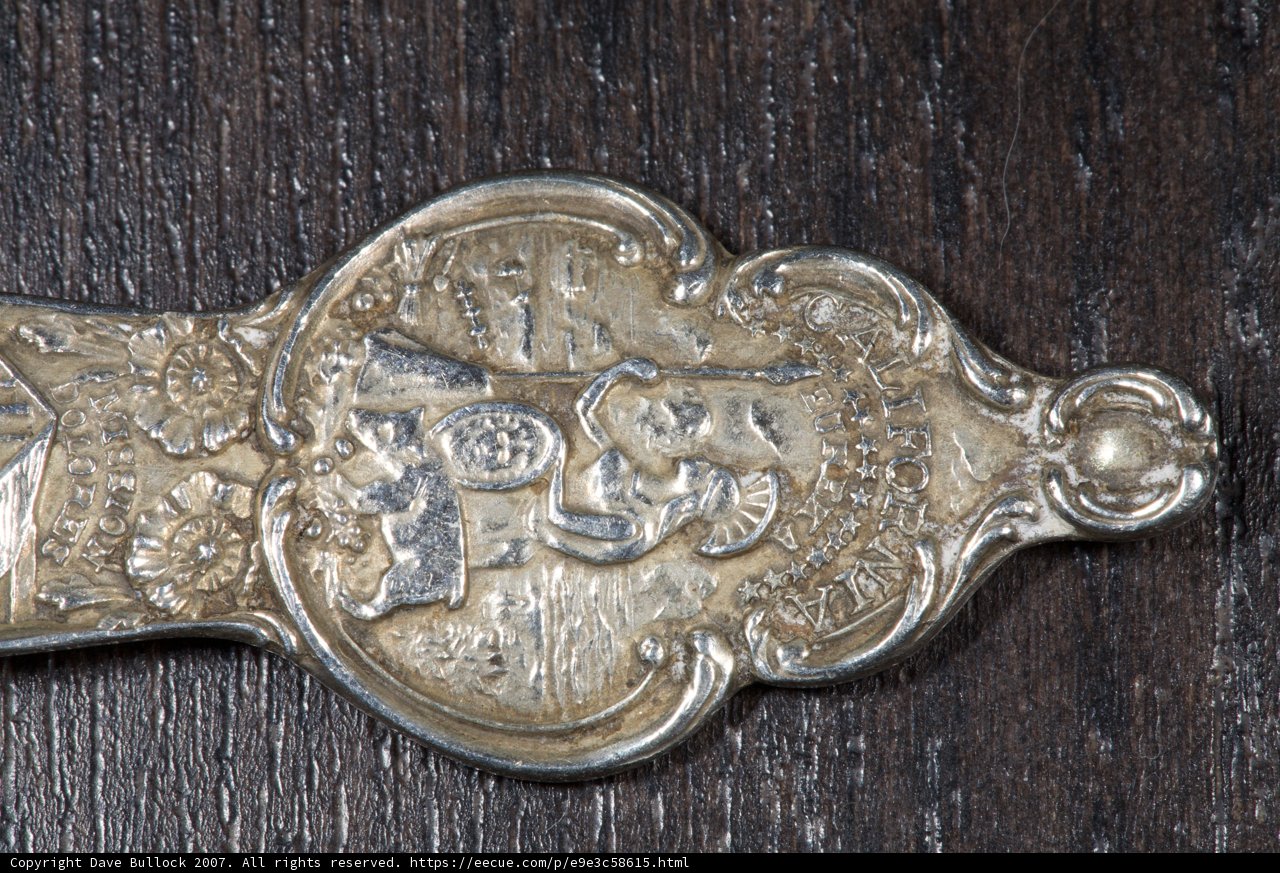 Artistic Spoon with a Bronze Logo
