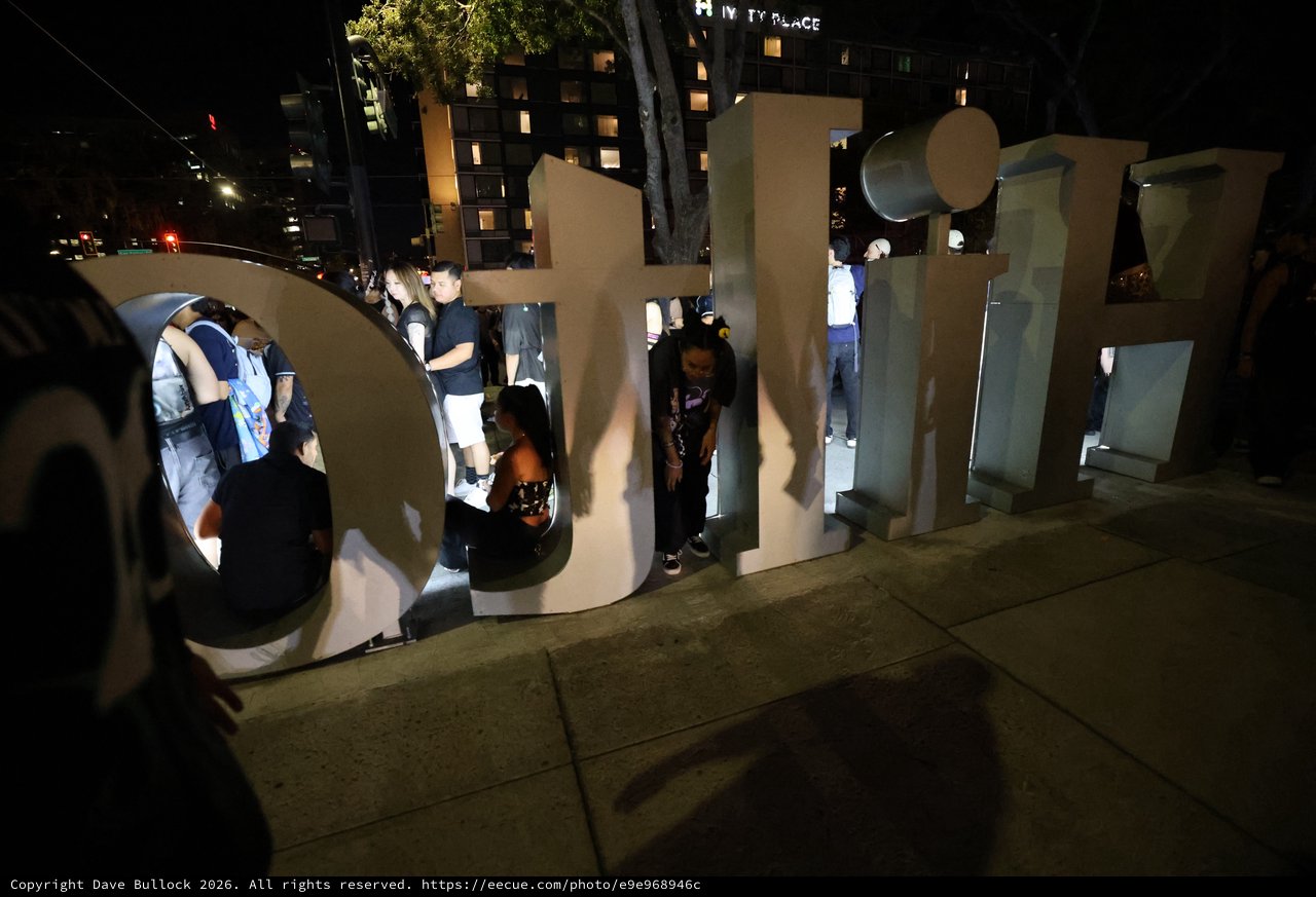 Crowd Gathers Around Giant Letters at Wobbleland Festival
