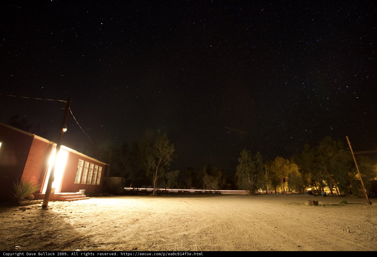 Cozy Red Hut Under the Starry Night Sky