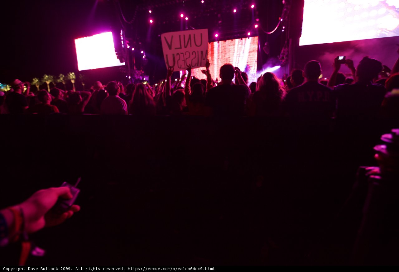 Concertgoers show their support with a sign