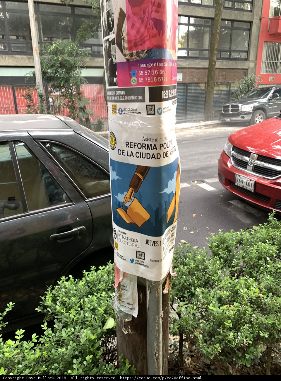 Car Advertisement Flyers on Urban Pole