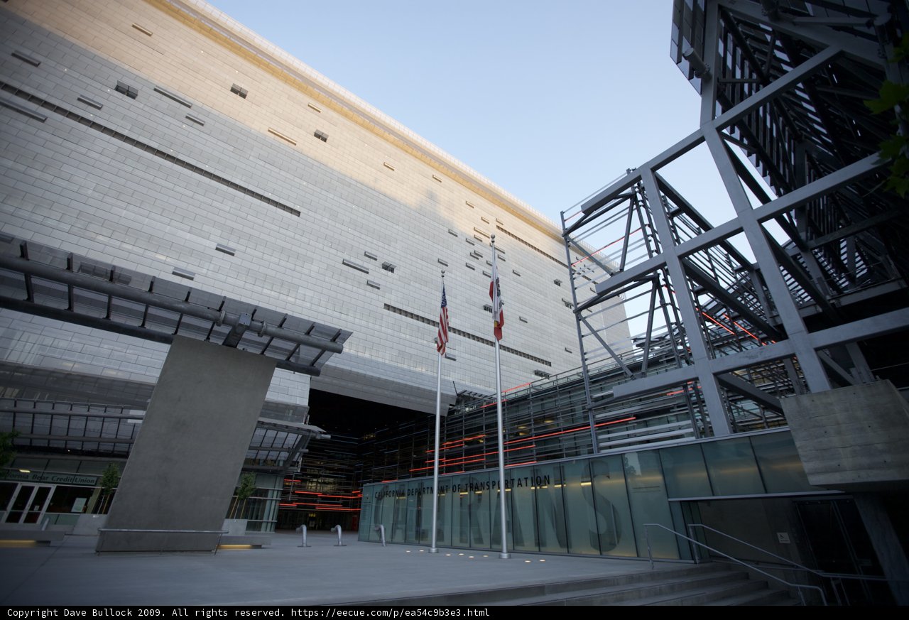 Modern Office Building with Glass Wall and Handrail