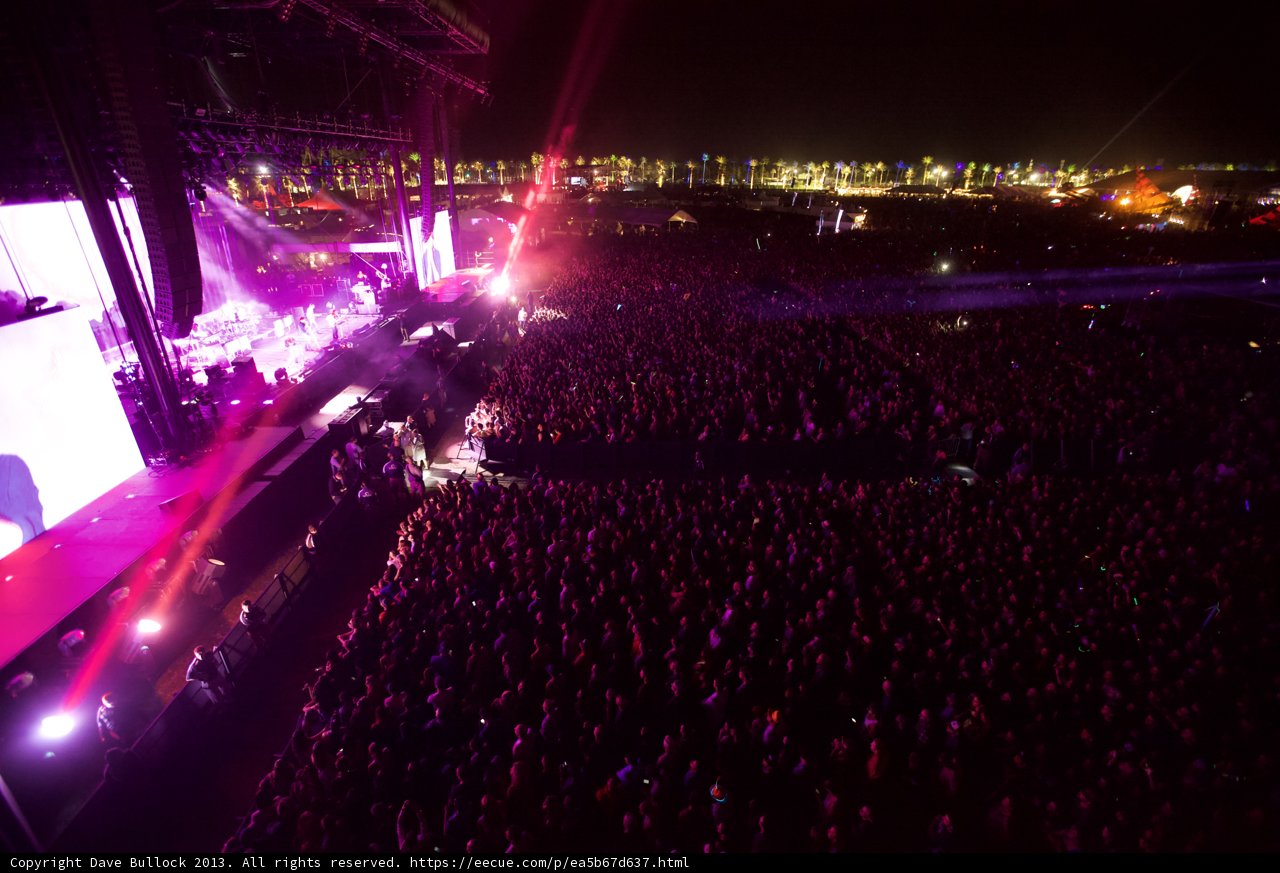 Coachella at Night: A Flare in the Crowd