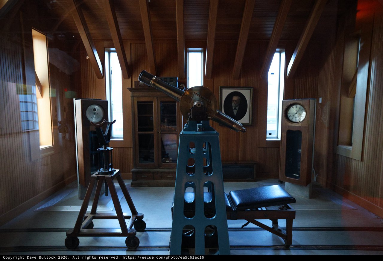 Historic Observatory Interior with Vintage Telescope