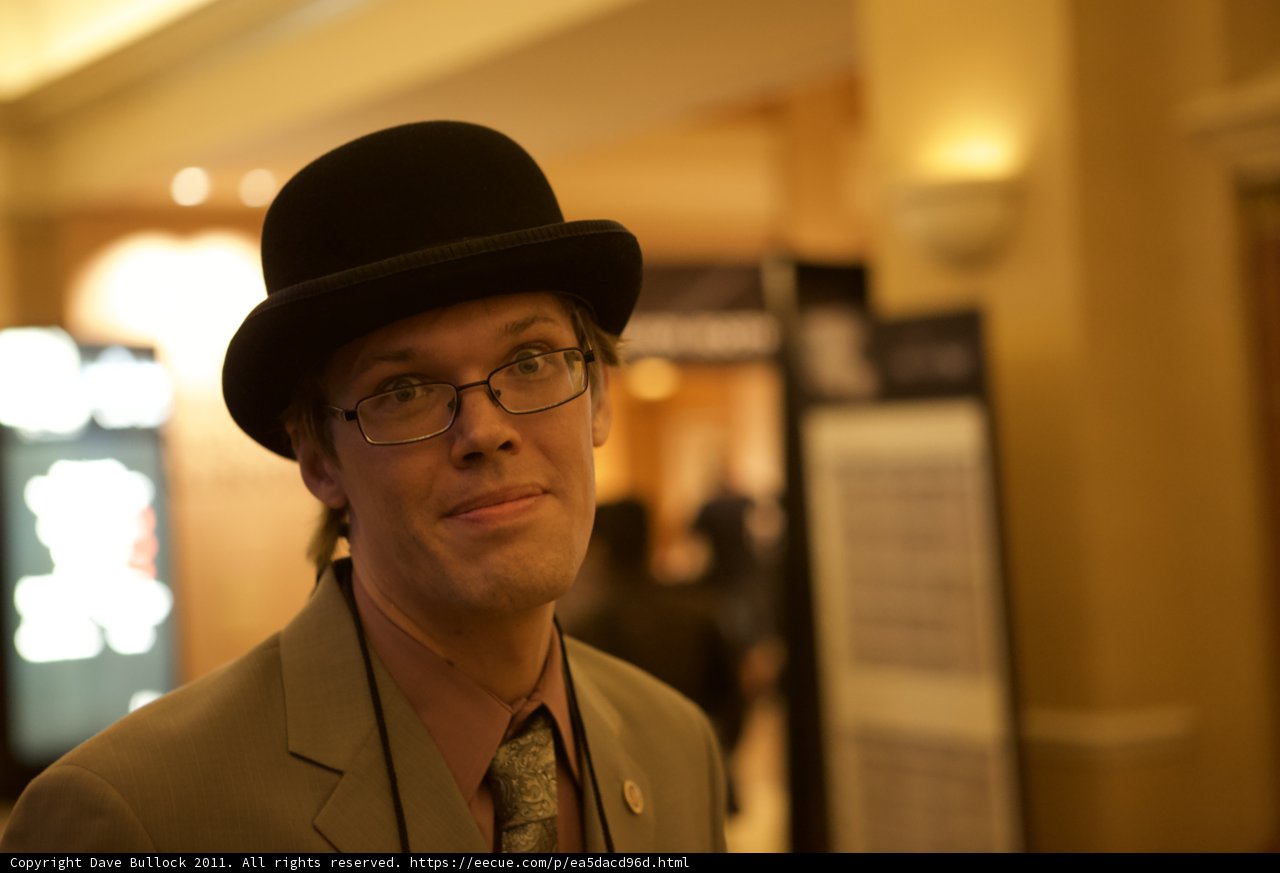 Hank Green Sporting a Stylish Sun Hat and Glasses