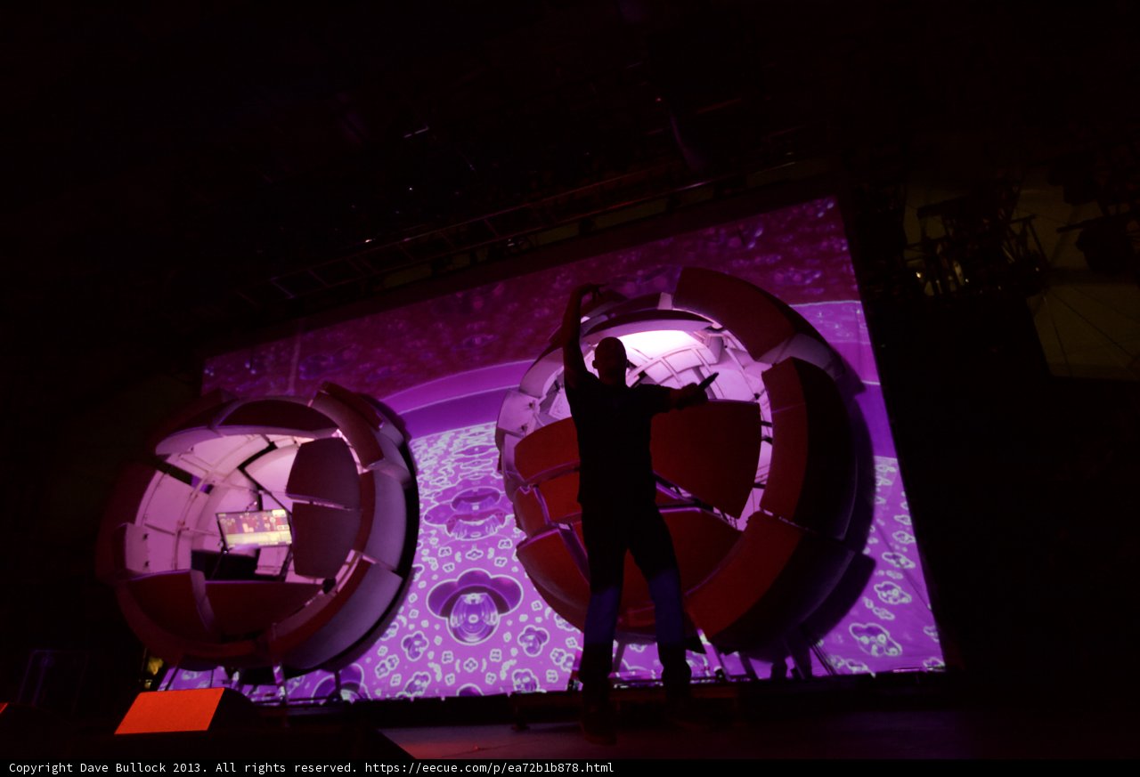 Man on Stage with Grand Screen