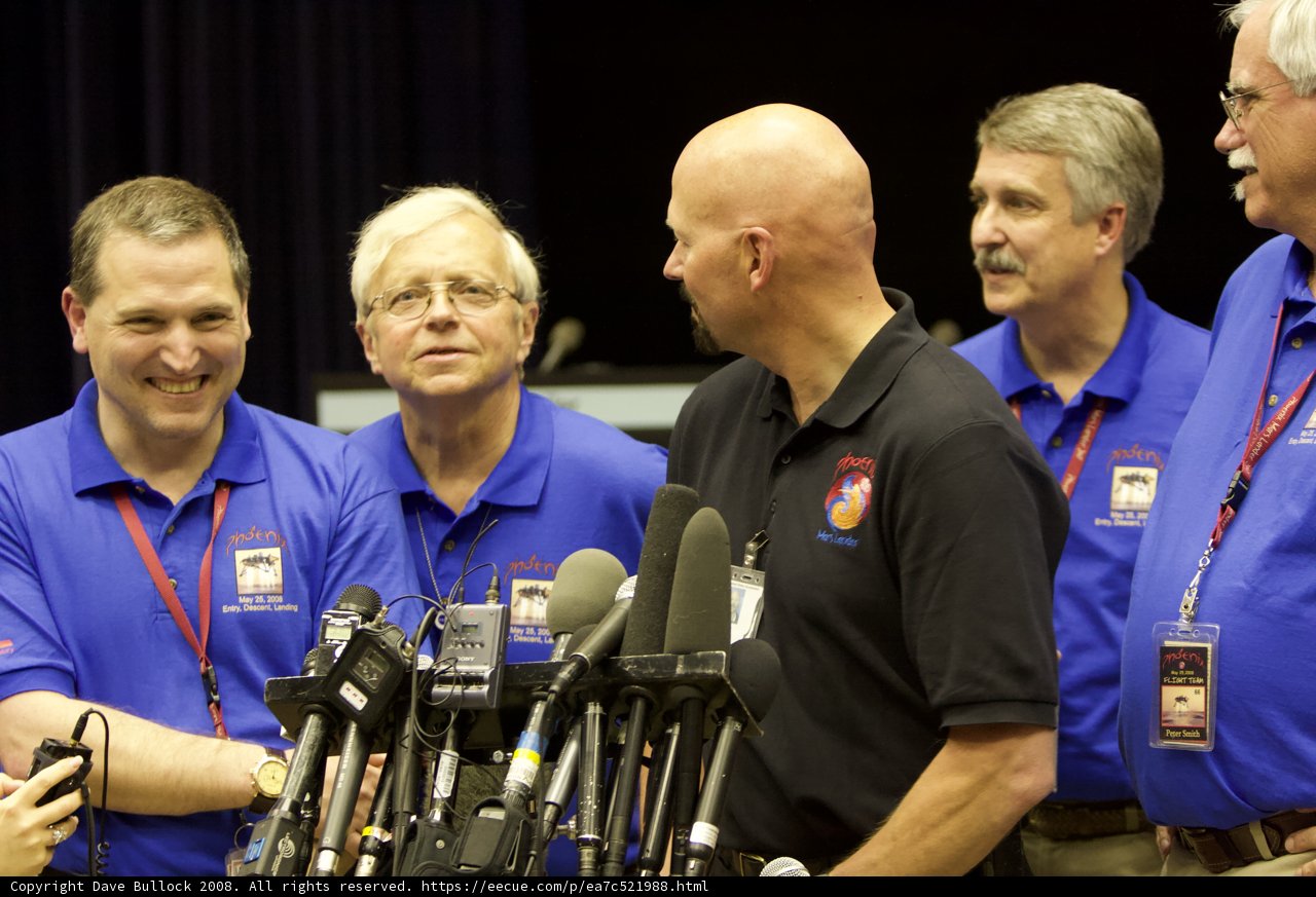Media Briefing with Blue Shirted Men