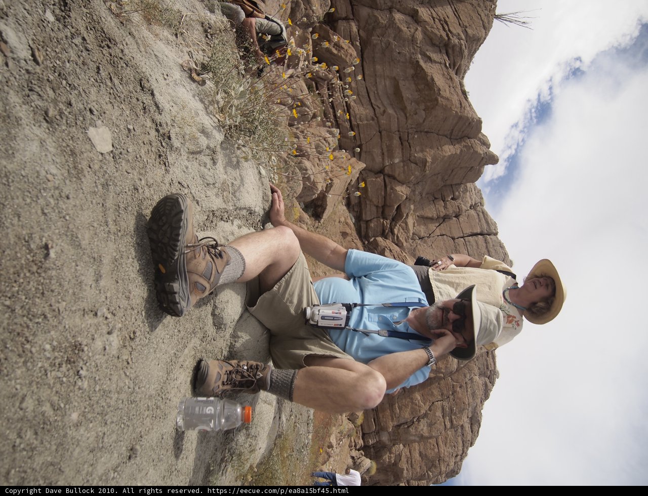 Man enjoying scenic view on rocky cliff