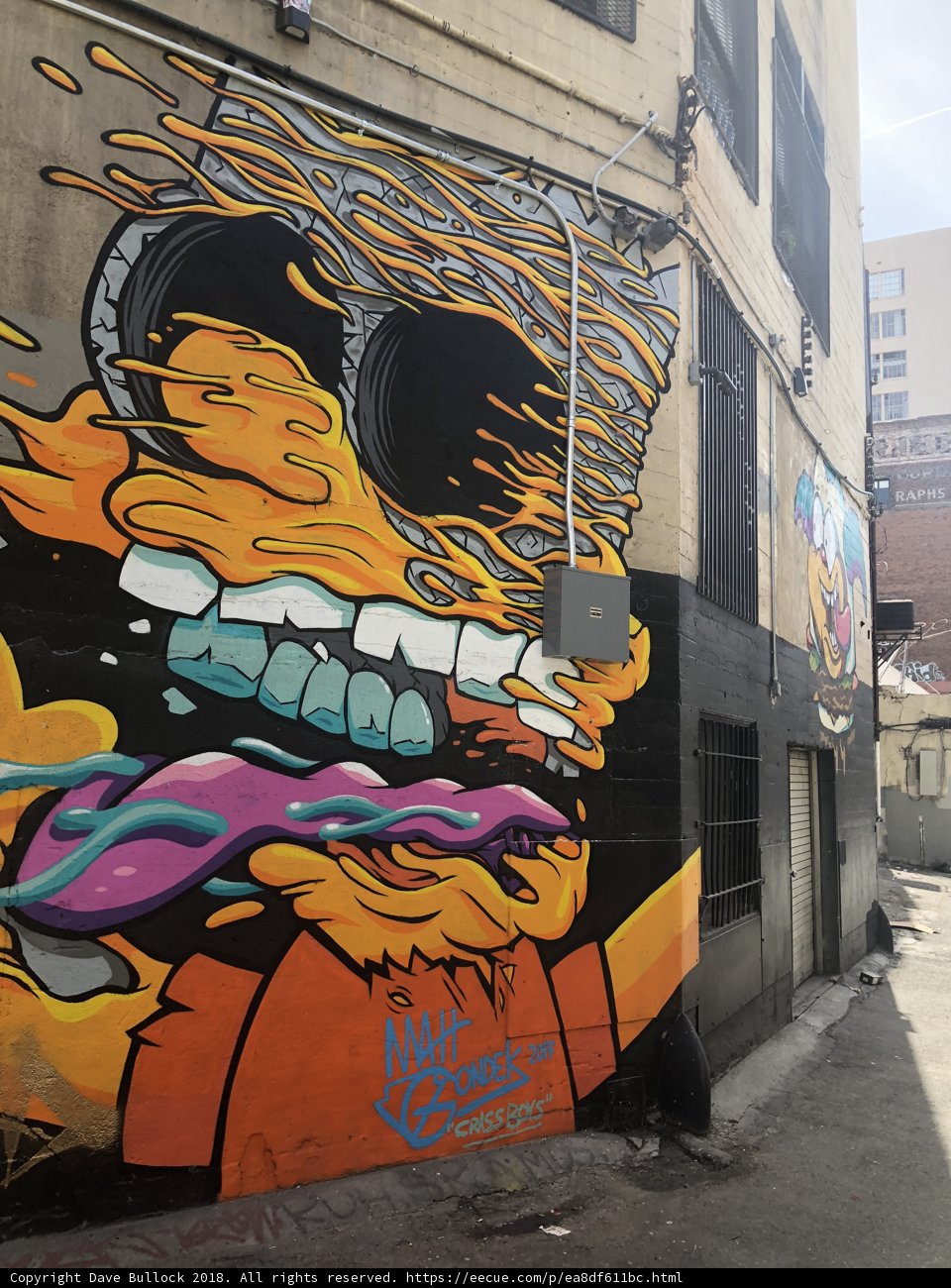Cartoon Character Mural on Urban Building