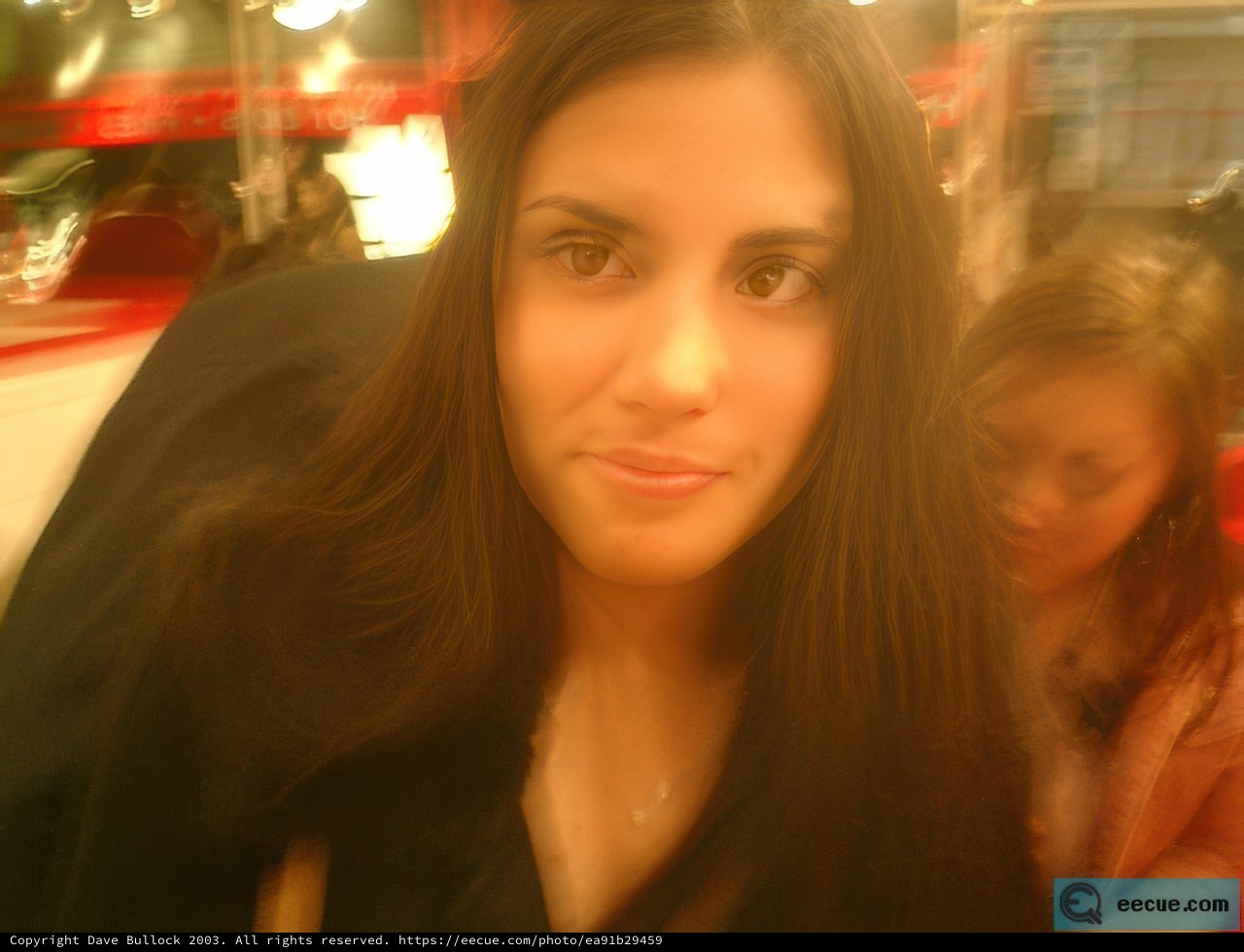 Blurred Self-Portrait in Urban Restaurant