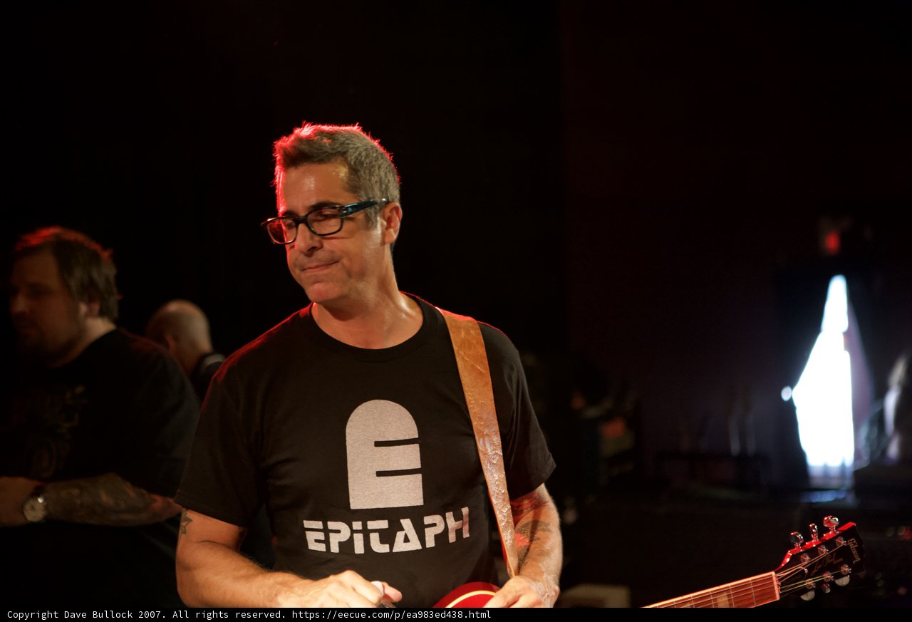 Brett Gurewitz rocks the stage with his electric guitar