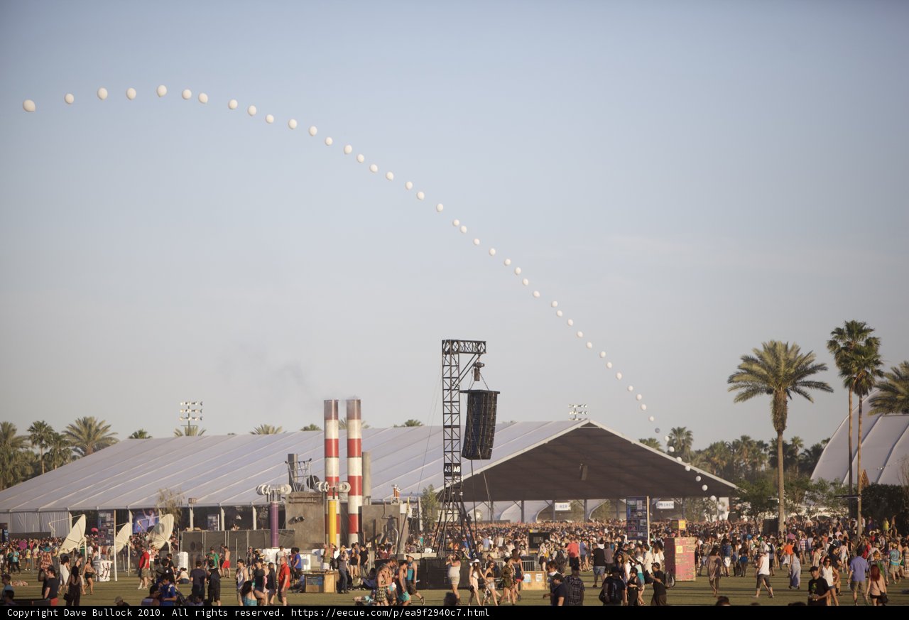 Festive Kite Flying Above Joyful Crowd