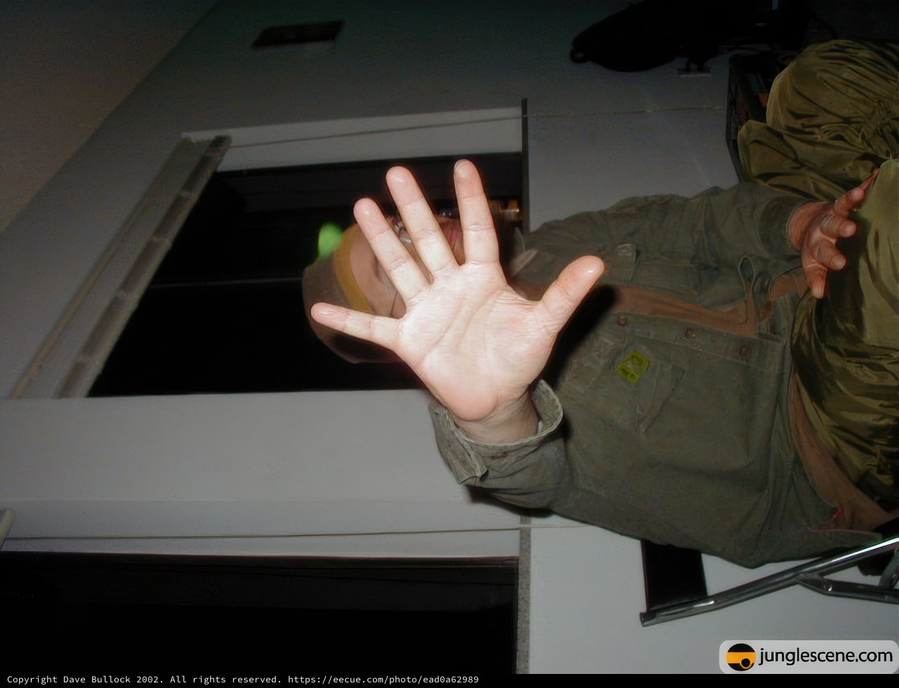 A Man's Hand in a Jacket Pocket