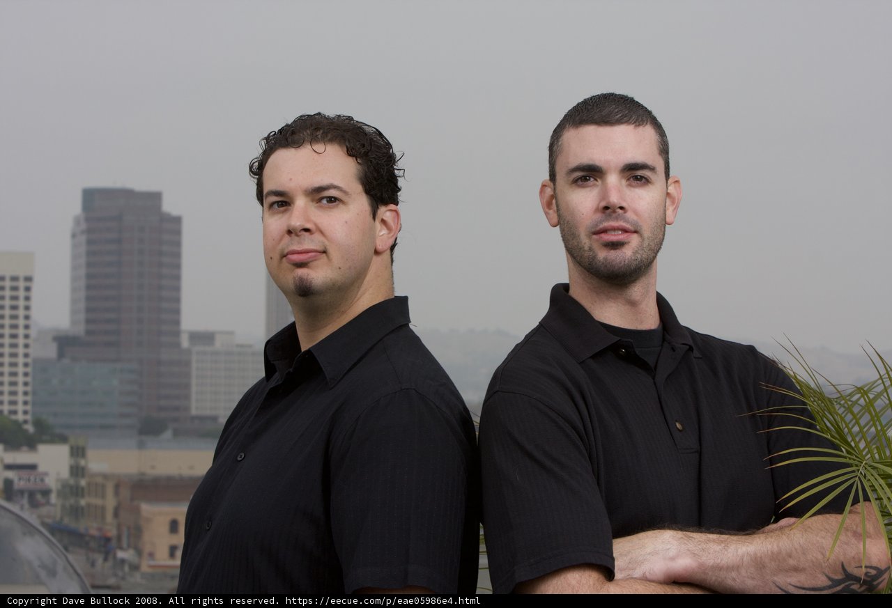 Dan and Dave Posed in Front of Skyscraper