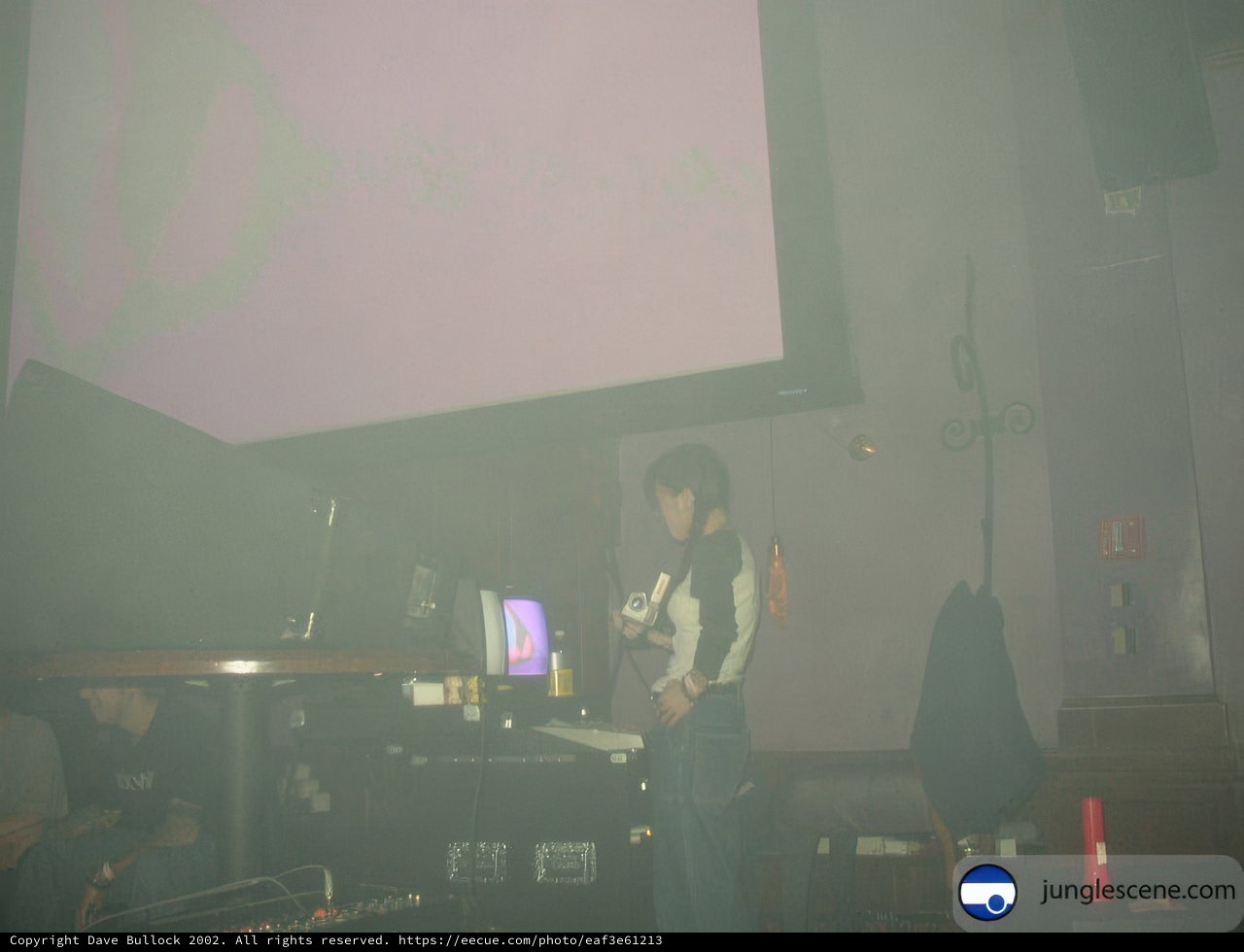 DJ Performing in a Dark Room
