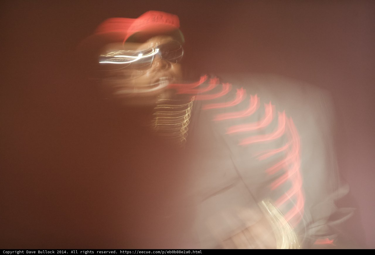 Blurred Portrait of a Man in a Red Hat