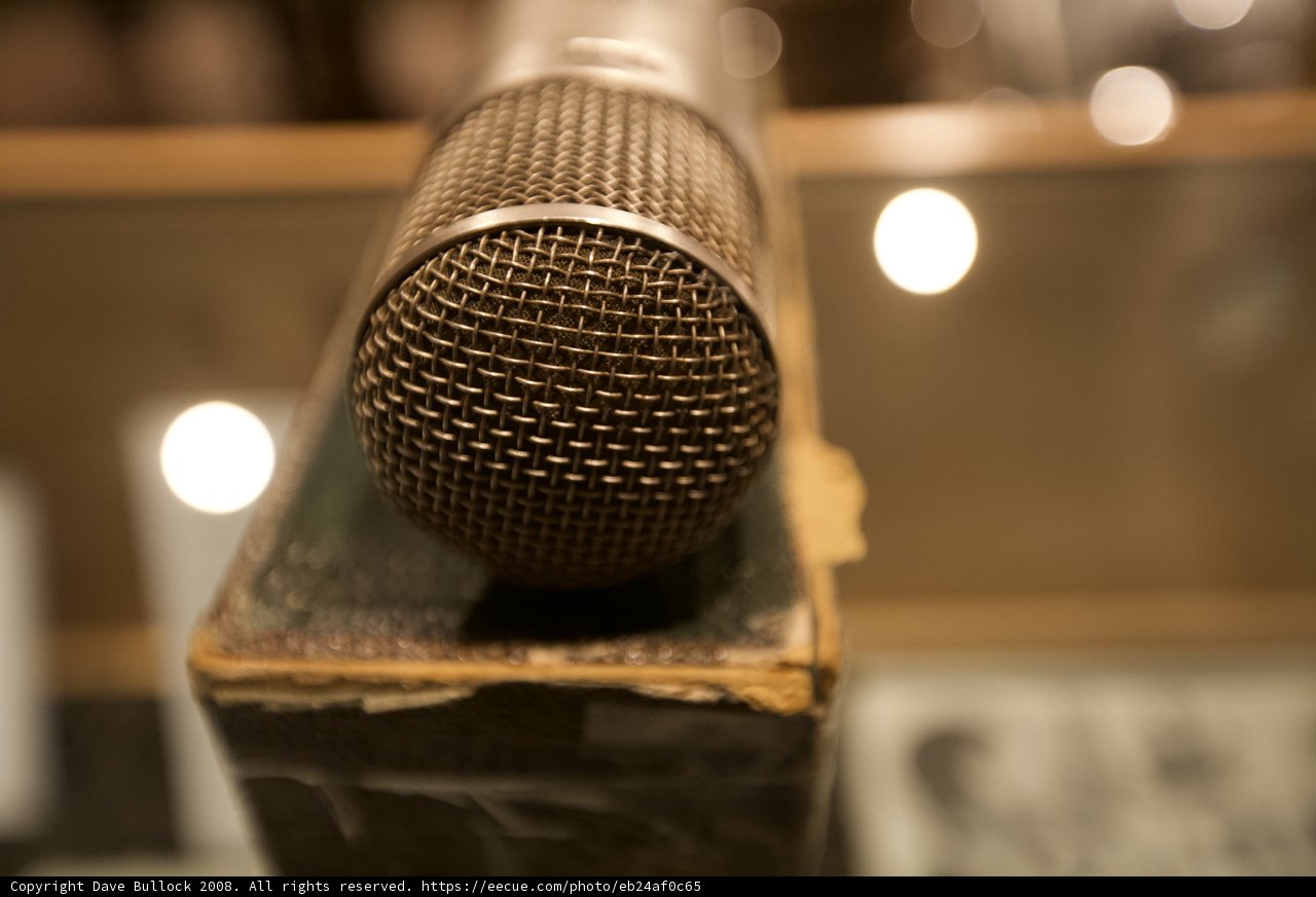 Vintage Microphone on Wooden Box