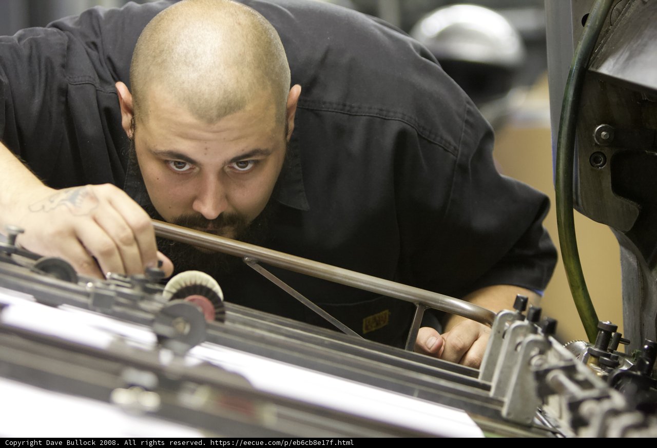 Black Shirted Man in a Manufacturing Plant