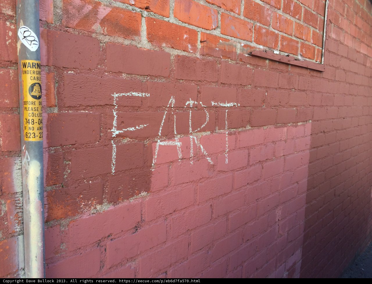 Graffiti Art on a Brick Wall