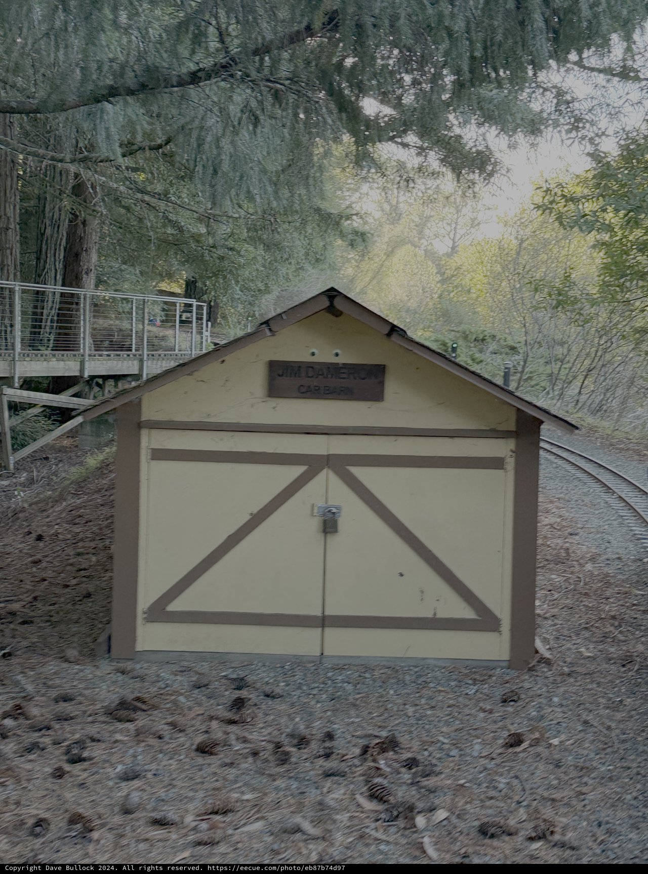 Vintage Railway Depot Building with Mountain Rails
