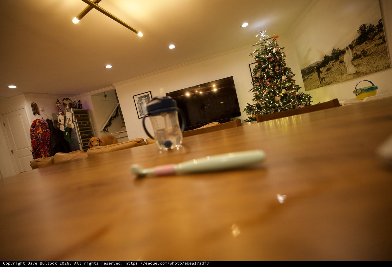 Cozy Home Workspace with Christmas Decorations at Night