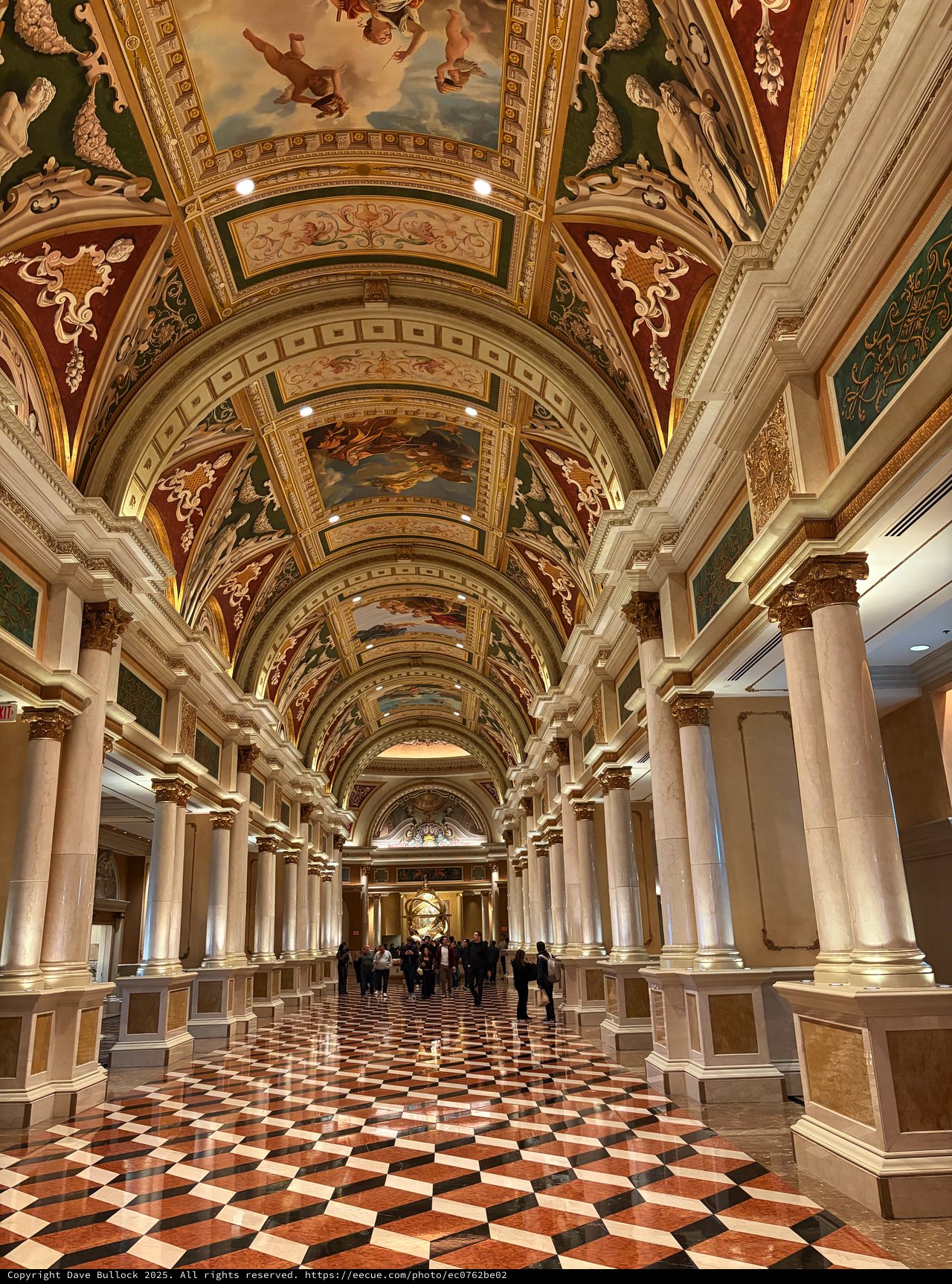Ornate Barrel-Vaulted Gallery with Classical Columns and Frescoes