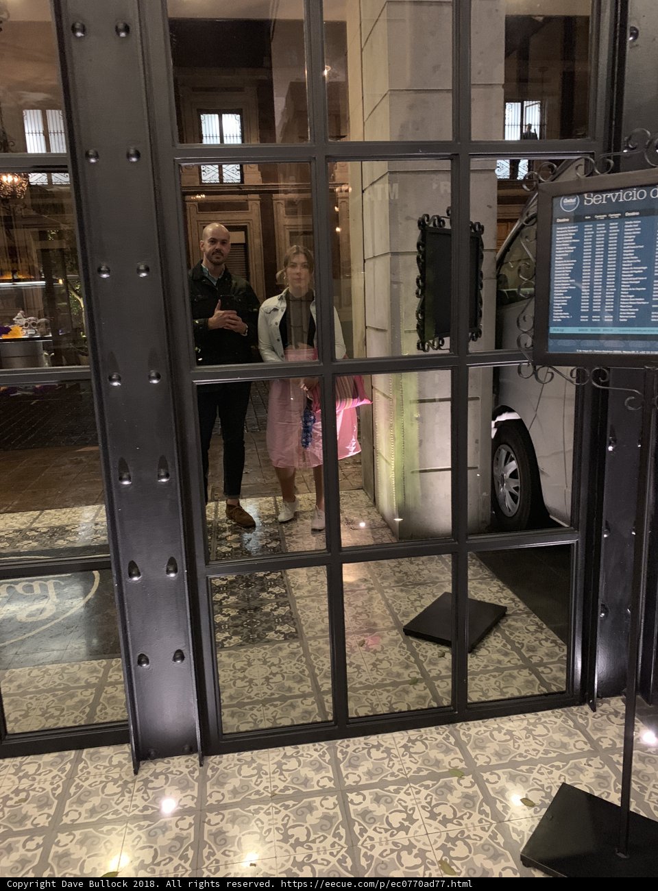 Standing at the Glass Door