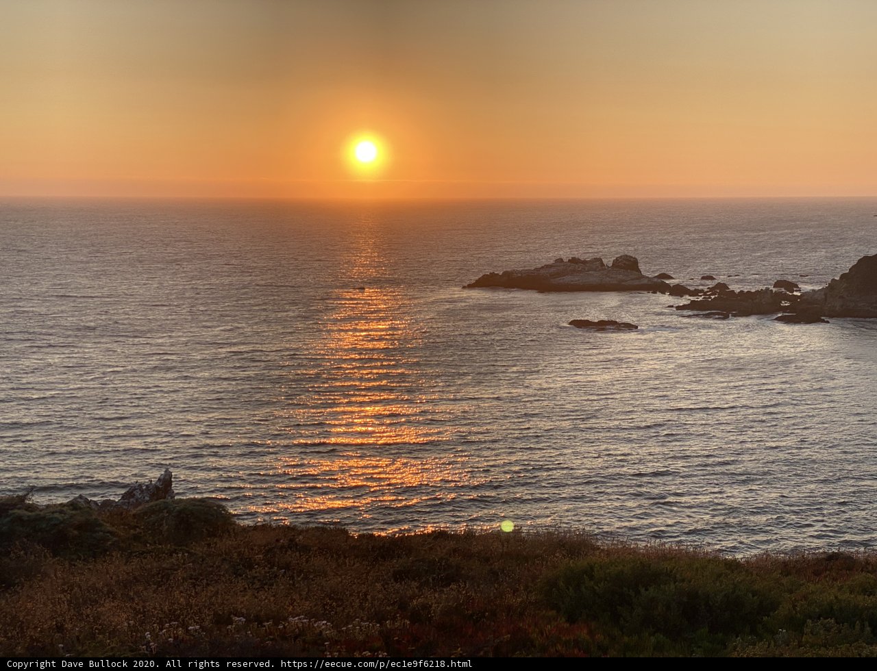 A Panoramic View of a Golden Sunset over the Pacific Ocean