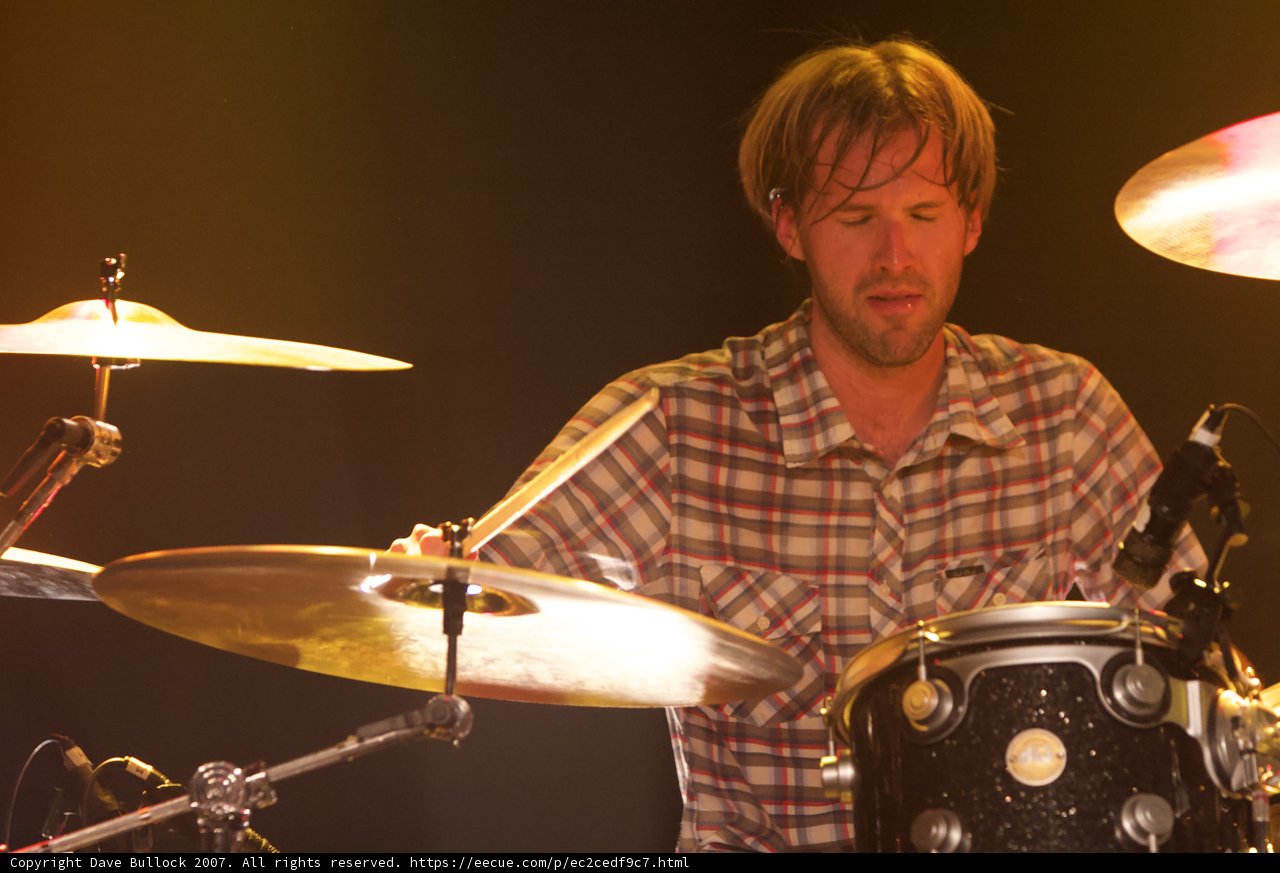 Brooks Wackerman playing drums on stage