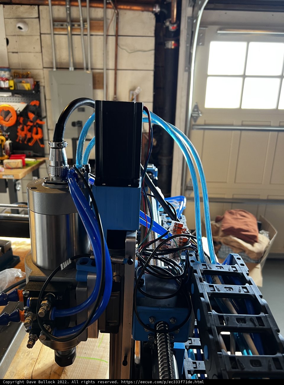 Manufacturing Machine with Hose Attachment