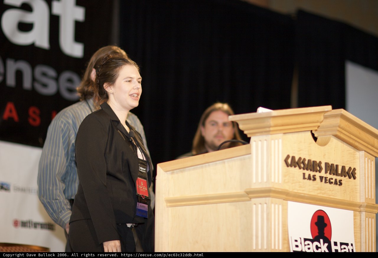 Woman Delivering a Speech Behind a Podium