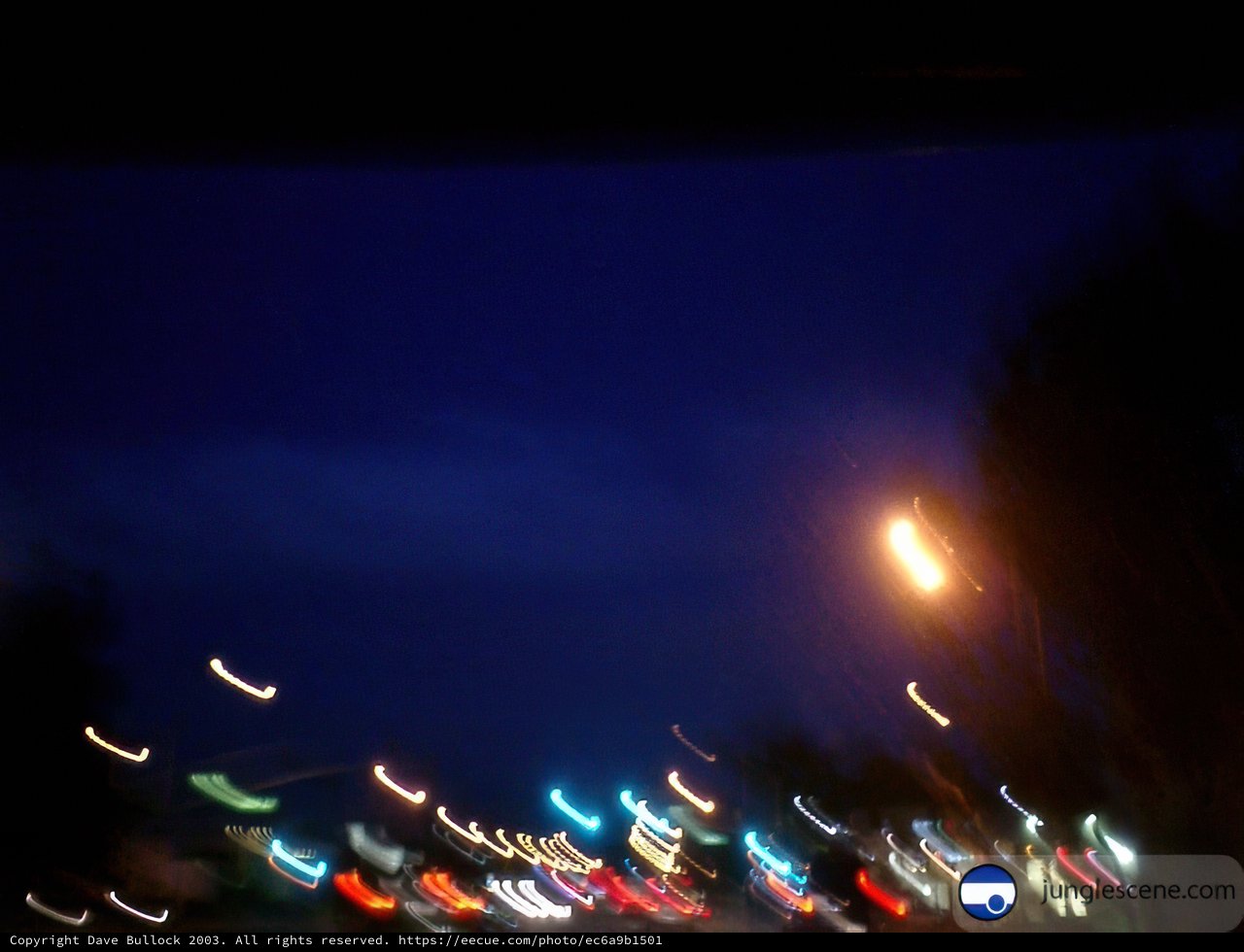 Blurred Street Lights under the Night Sky