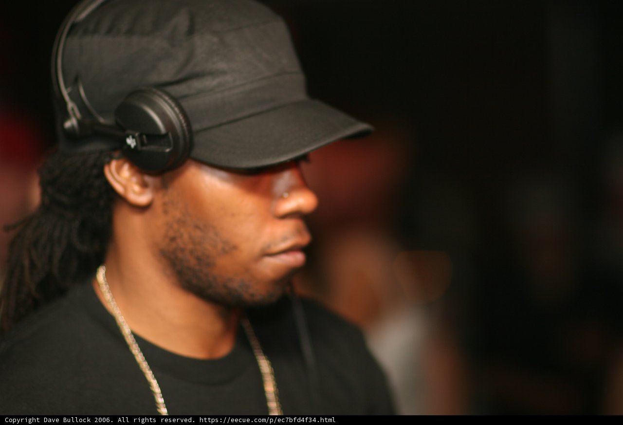 Man in Hat and Headphones