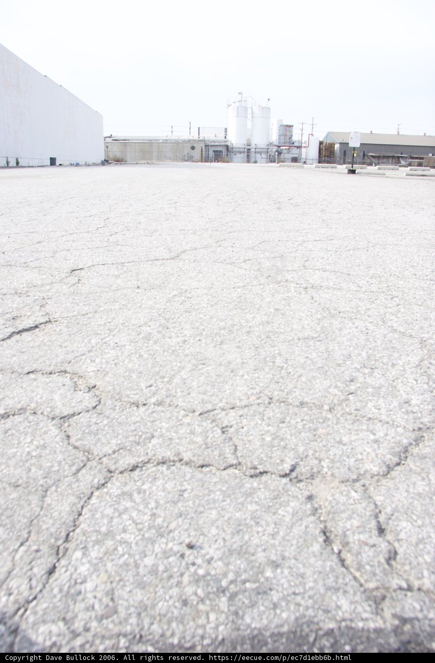 Lone Walker on the Tarmac