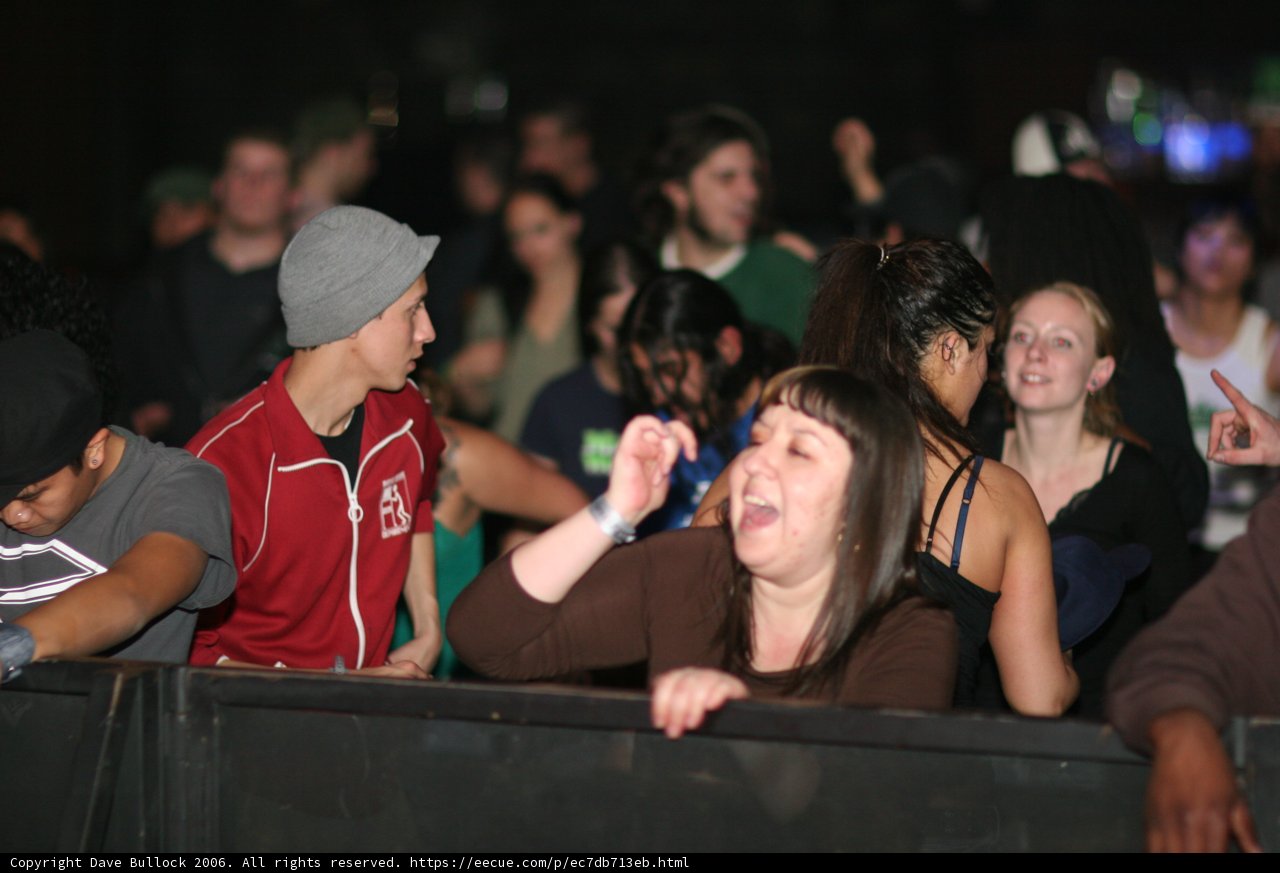 Laughter and Baseball Caps in the Crowd