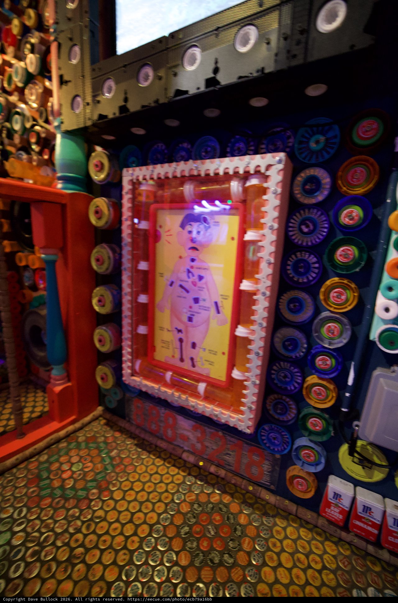 Whimsical Bottle Cap Mosaic Art Installation Interior