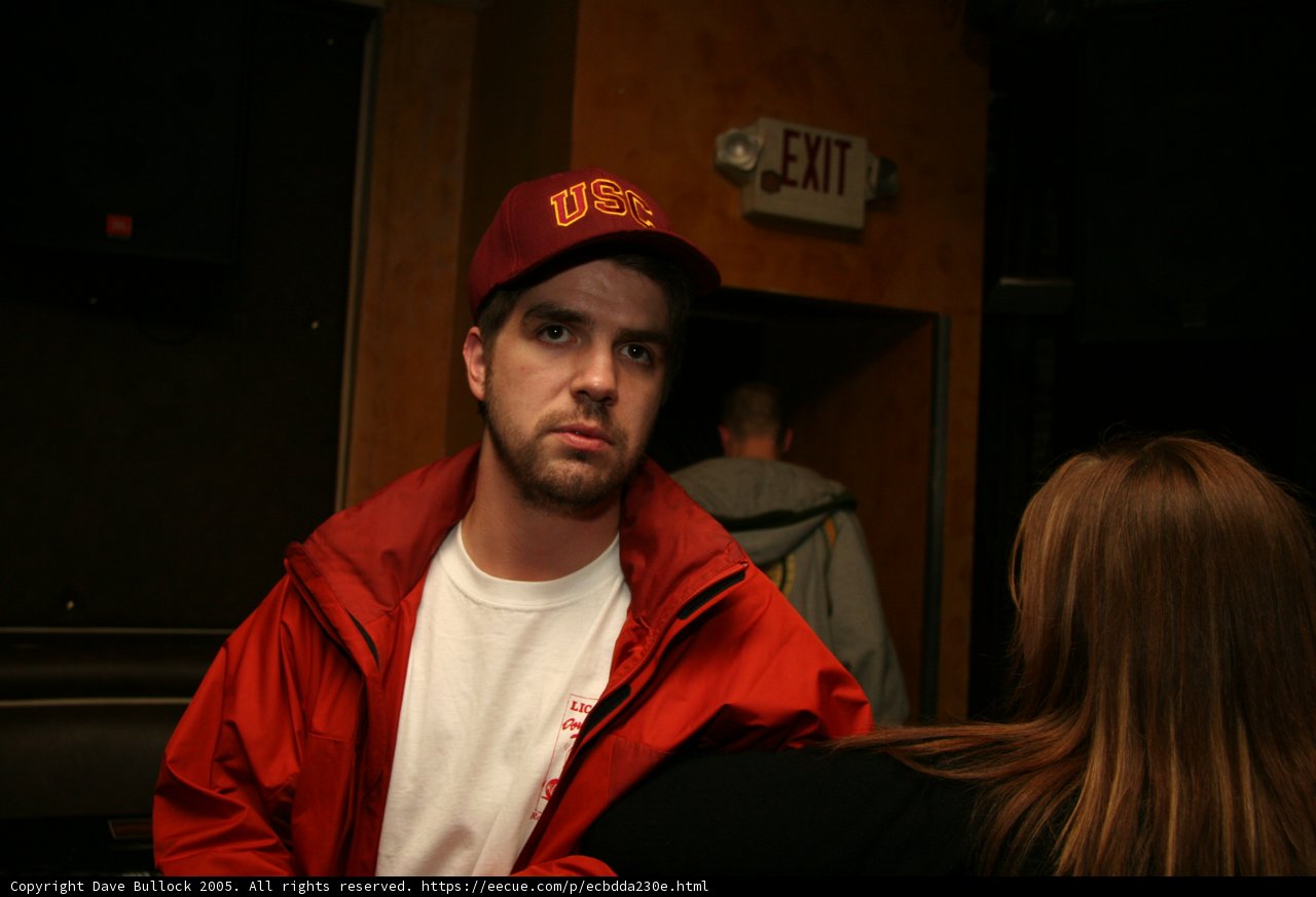 Red Jacket and Baseball Cap at the Pub
