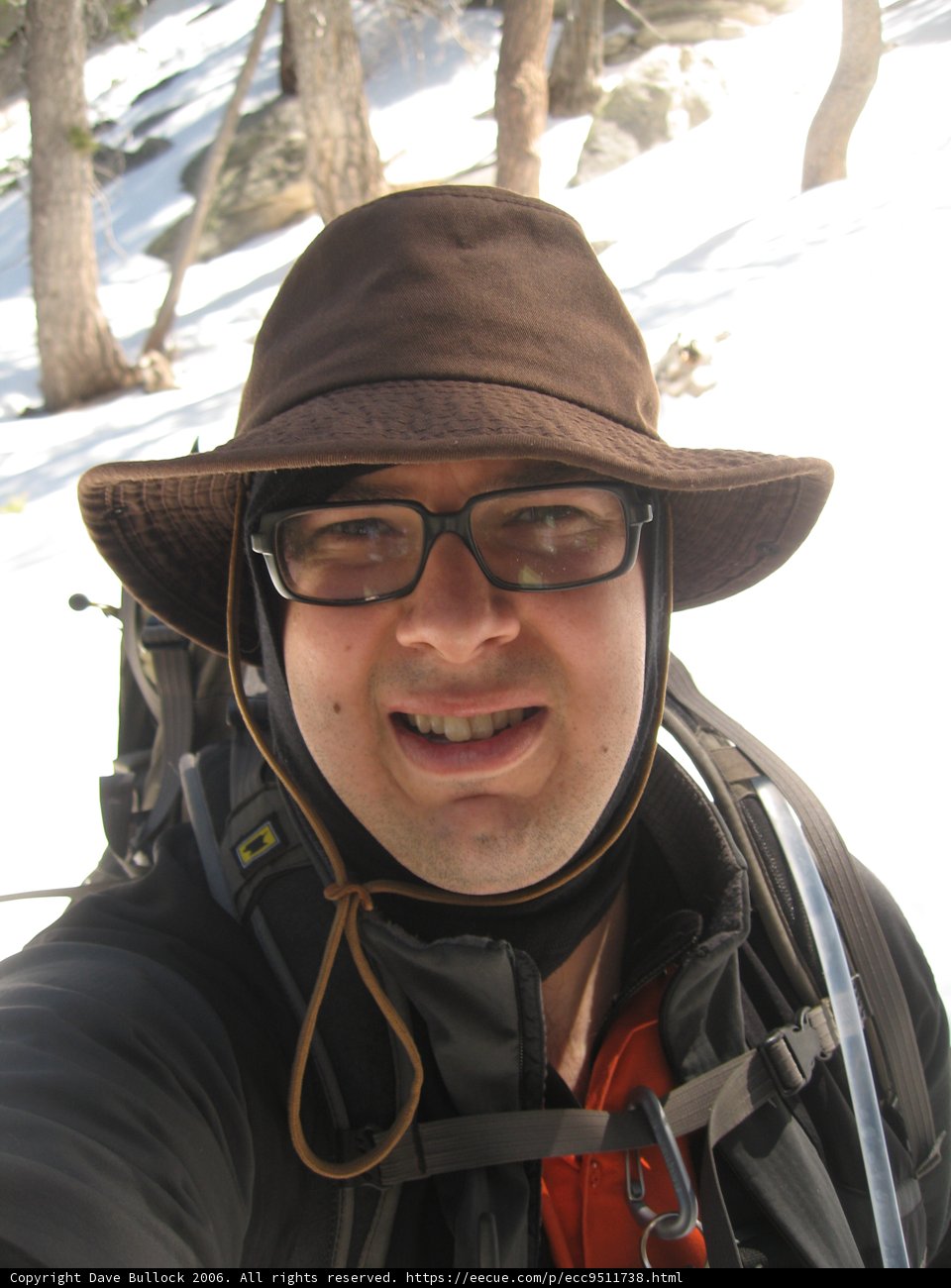 The Stylish Man with a Sun Hat