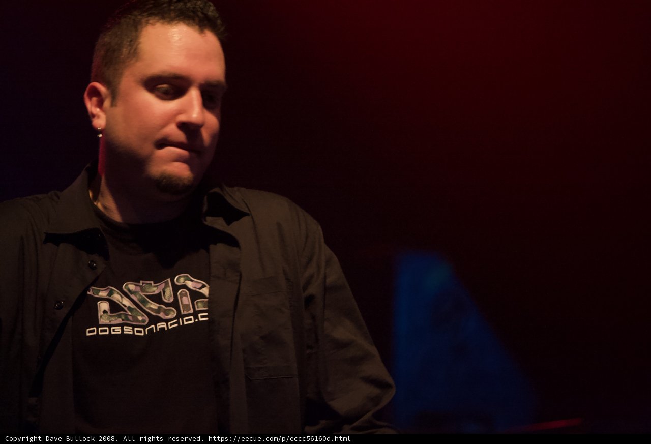 Portrait of a Black Shirted Man on Stage