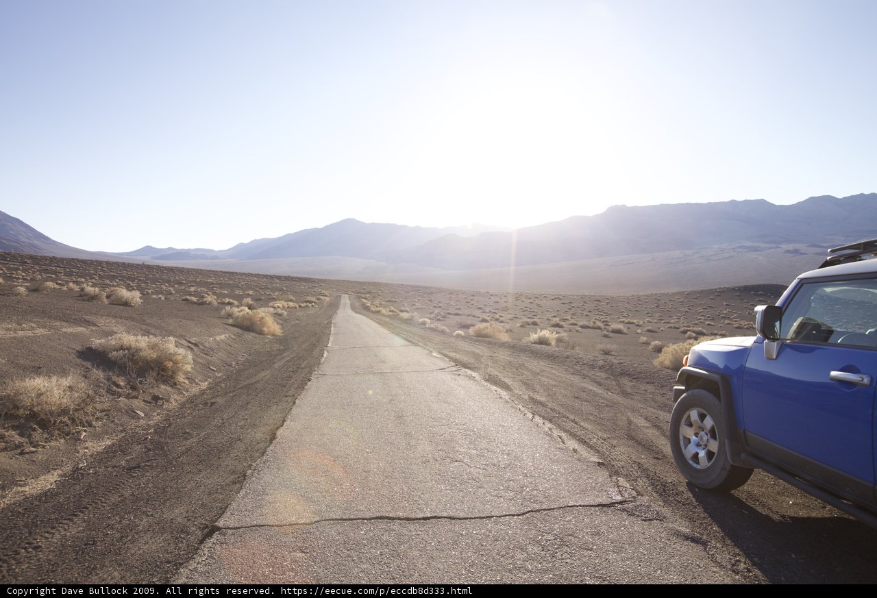 Overcoming the Terrain in a Blue Jeep