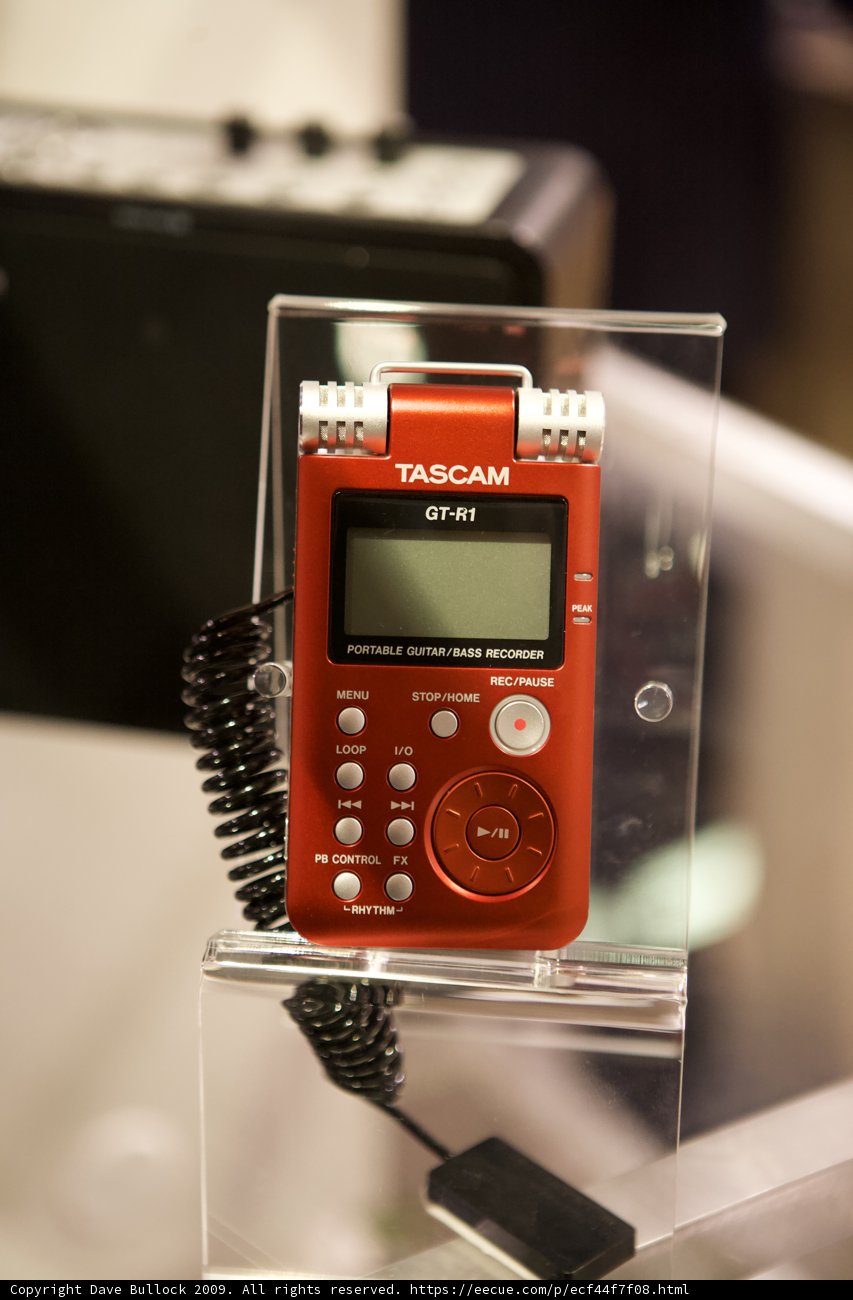 Red Digital Clock on Display Case