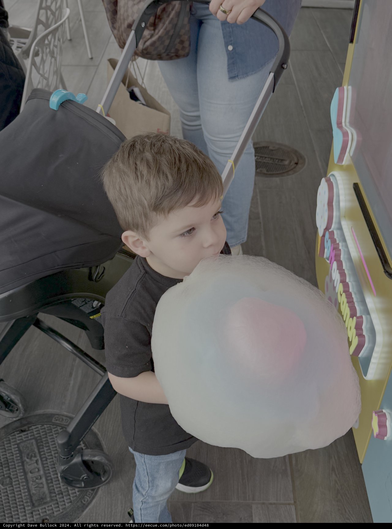 Young Boy Enjoying Cotton Candy Treat