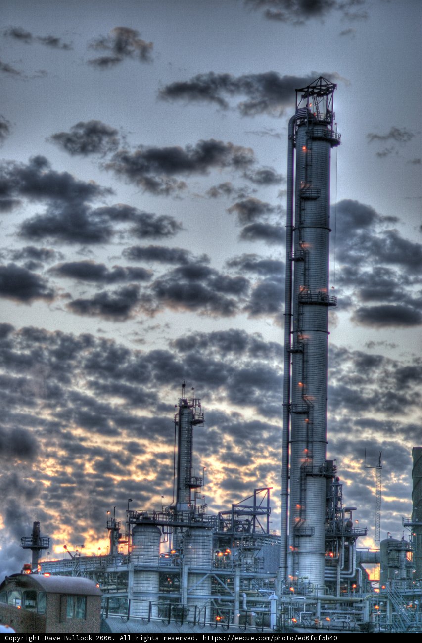Towering Refinery Factory in the Clouds