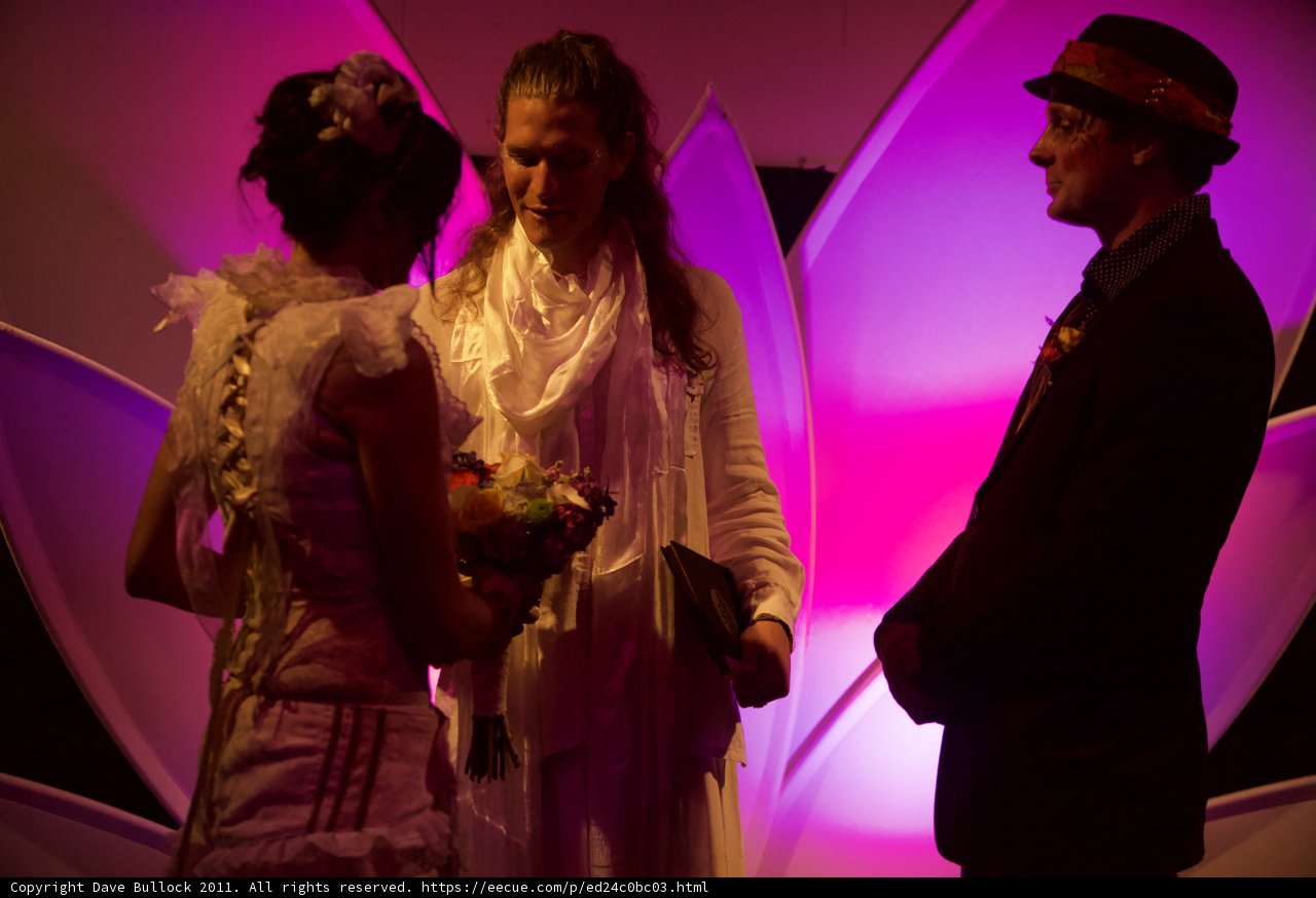 The newlyweds in purple light