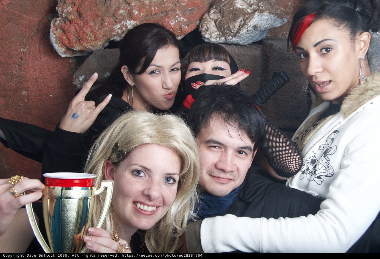 Halloween Group Celebration with Trophy and Ninja Costume