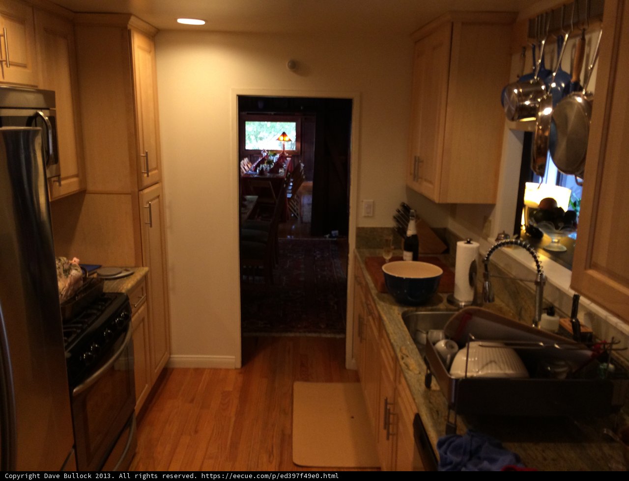 Wooden flooring and modern appliances in Altadena kitchen