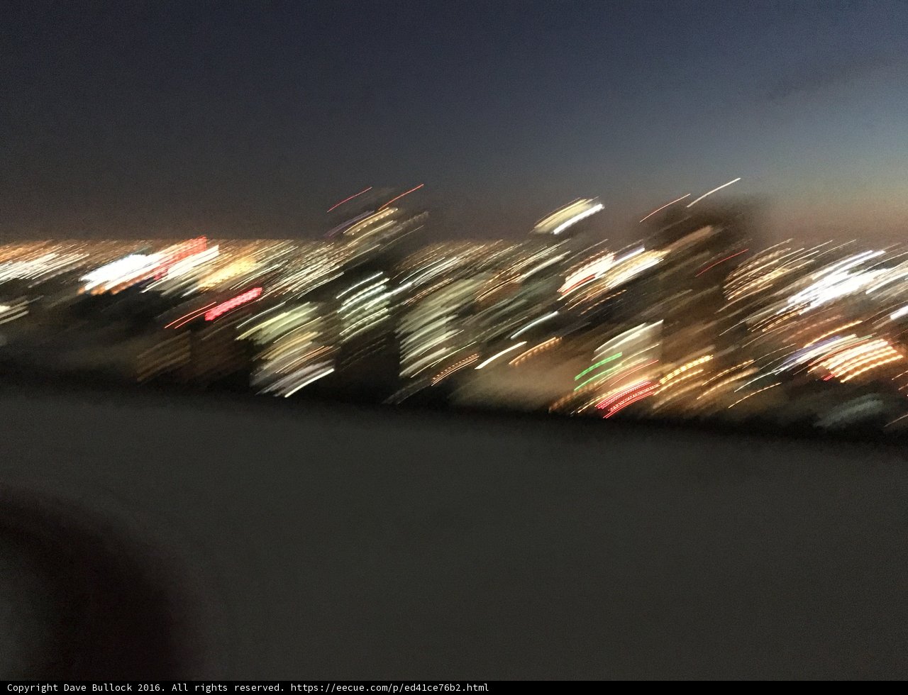 Nighttime Metropolis from an Airplane Window