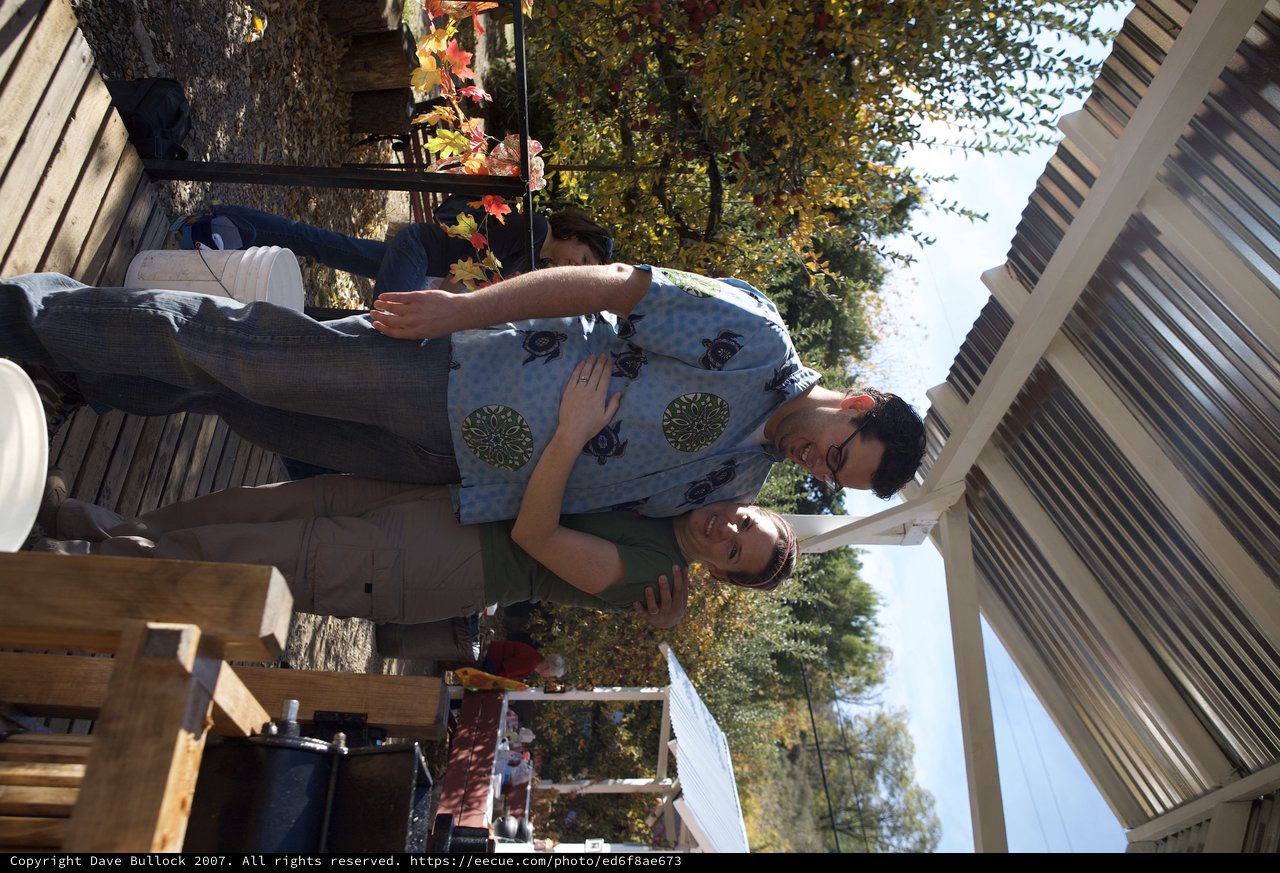 Couple Embracing at Autumn Apple Farm Outing